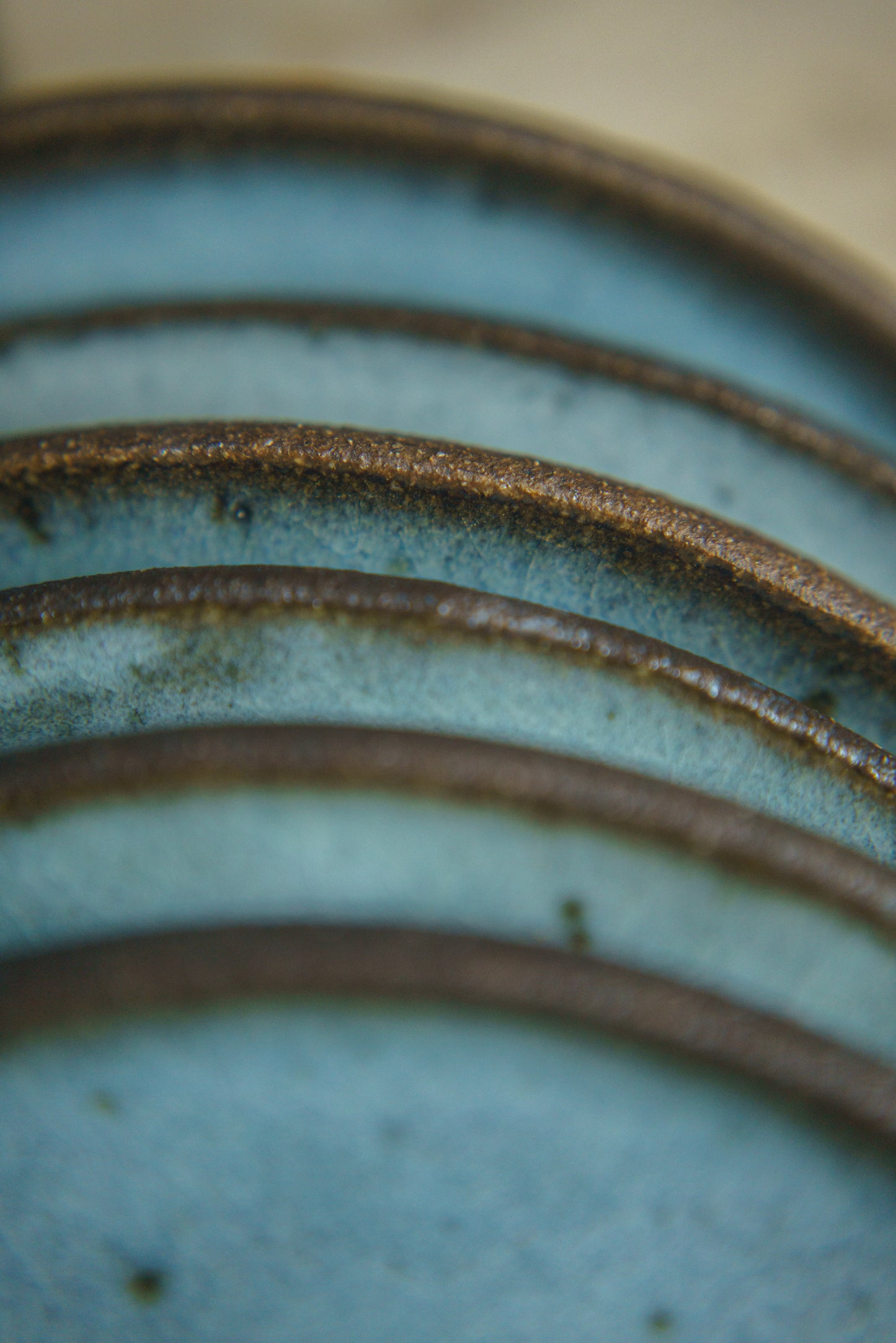 Icy Blue Plate Set on Dark Clay