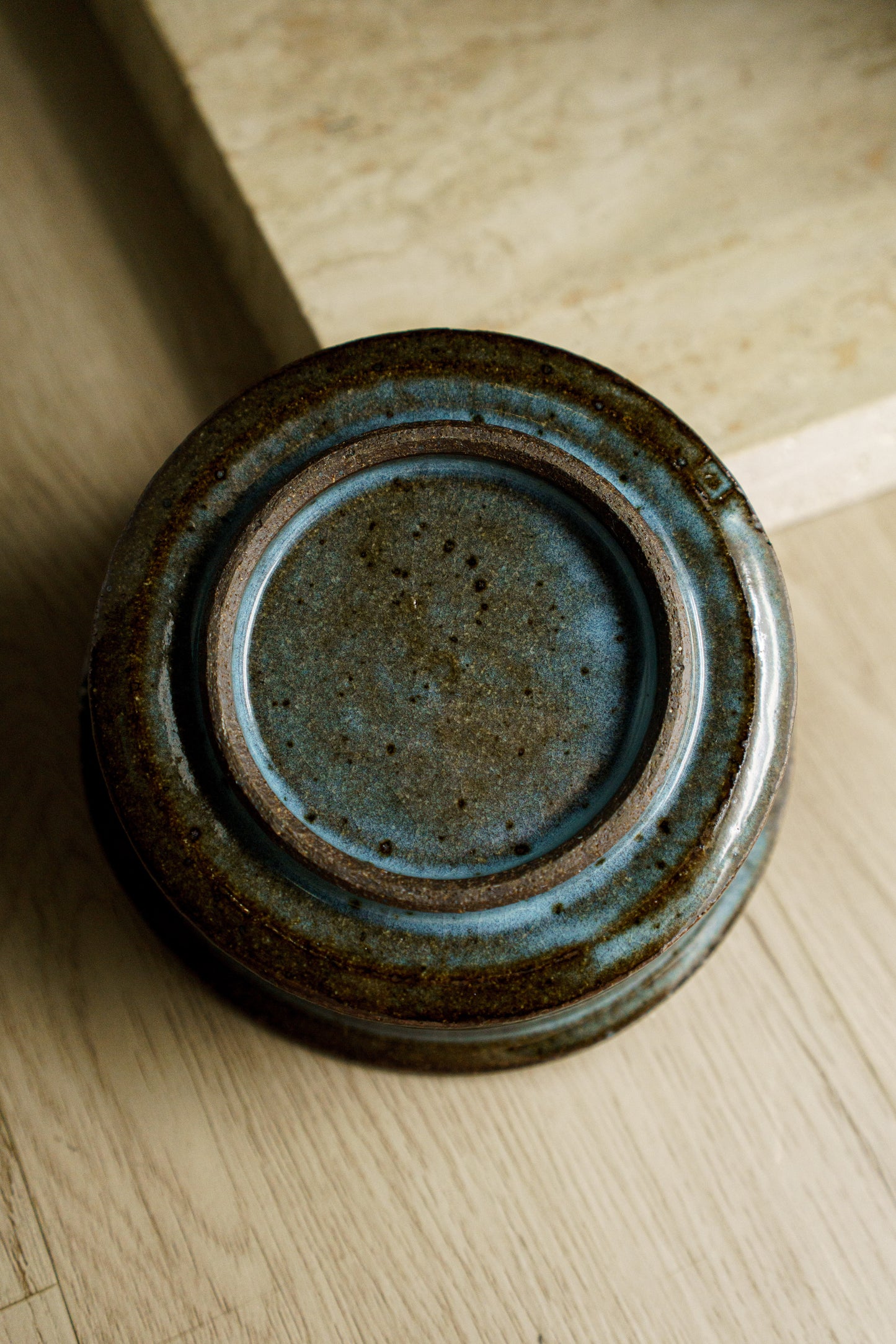 Icy Blue Zoetrope Bowl on Dark Clay