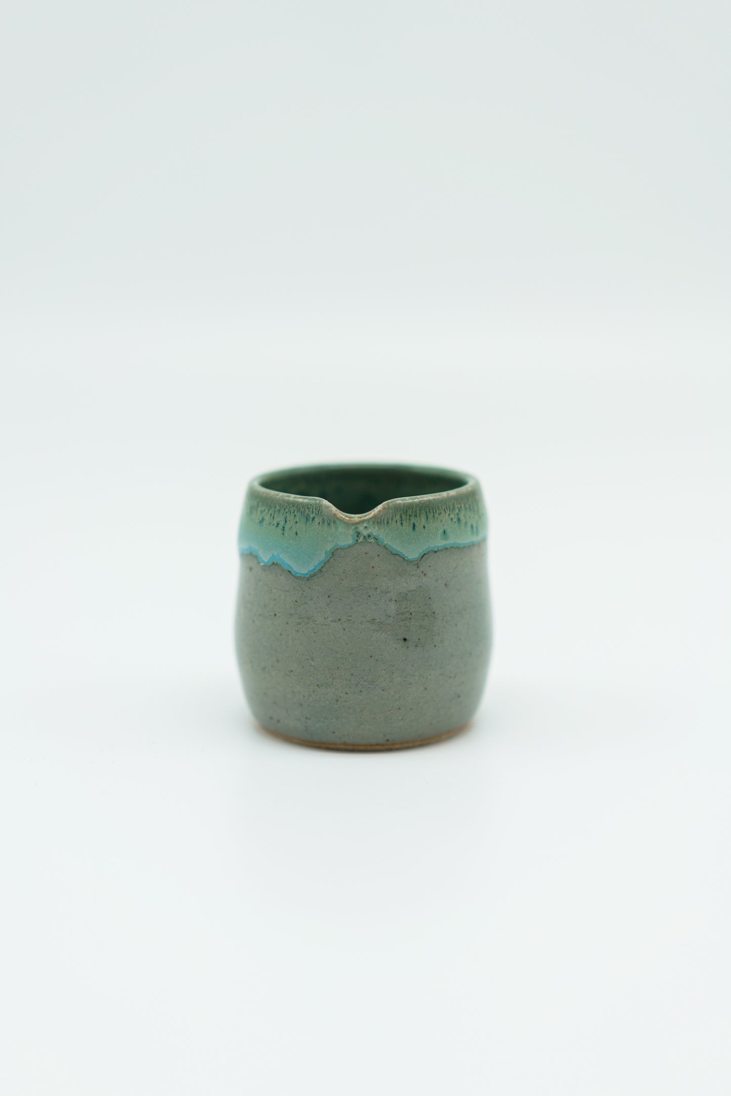 Rounded Cream Jug with Blue Rim