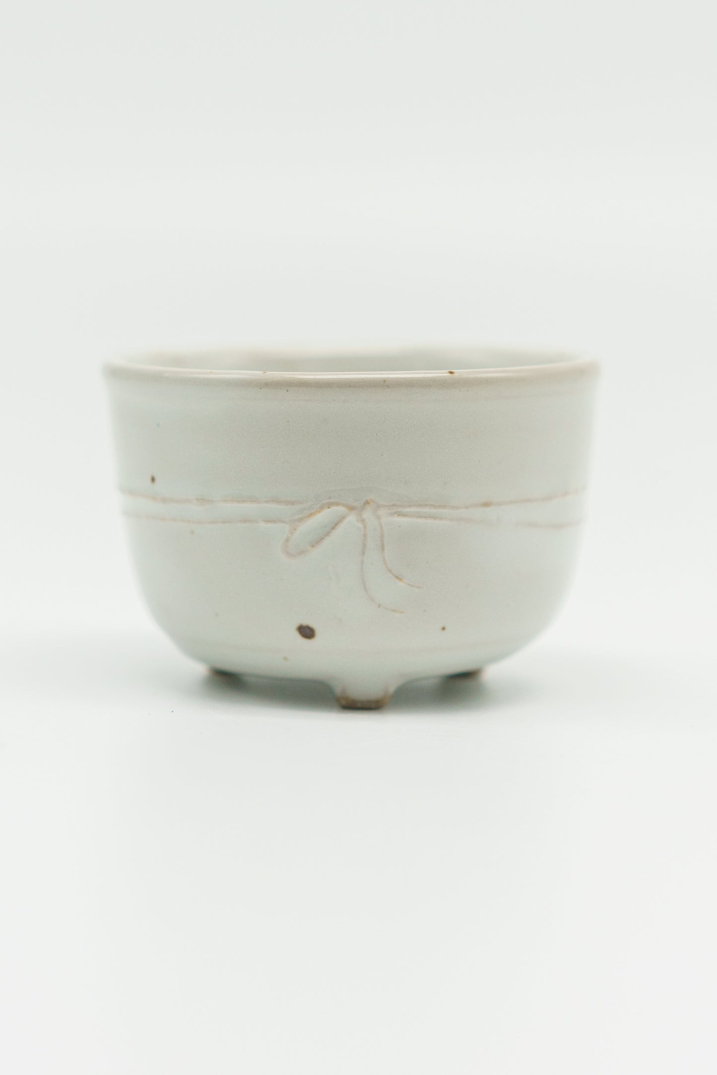 White Ribbon Teacup with Beauty Mark