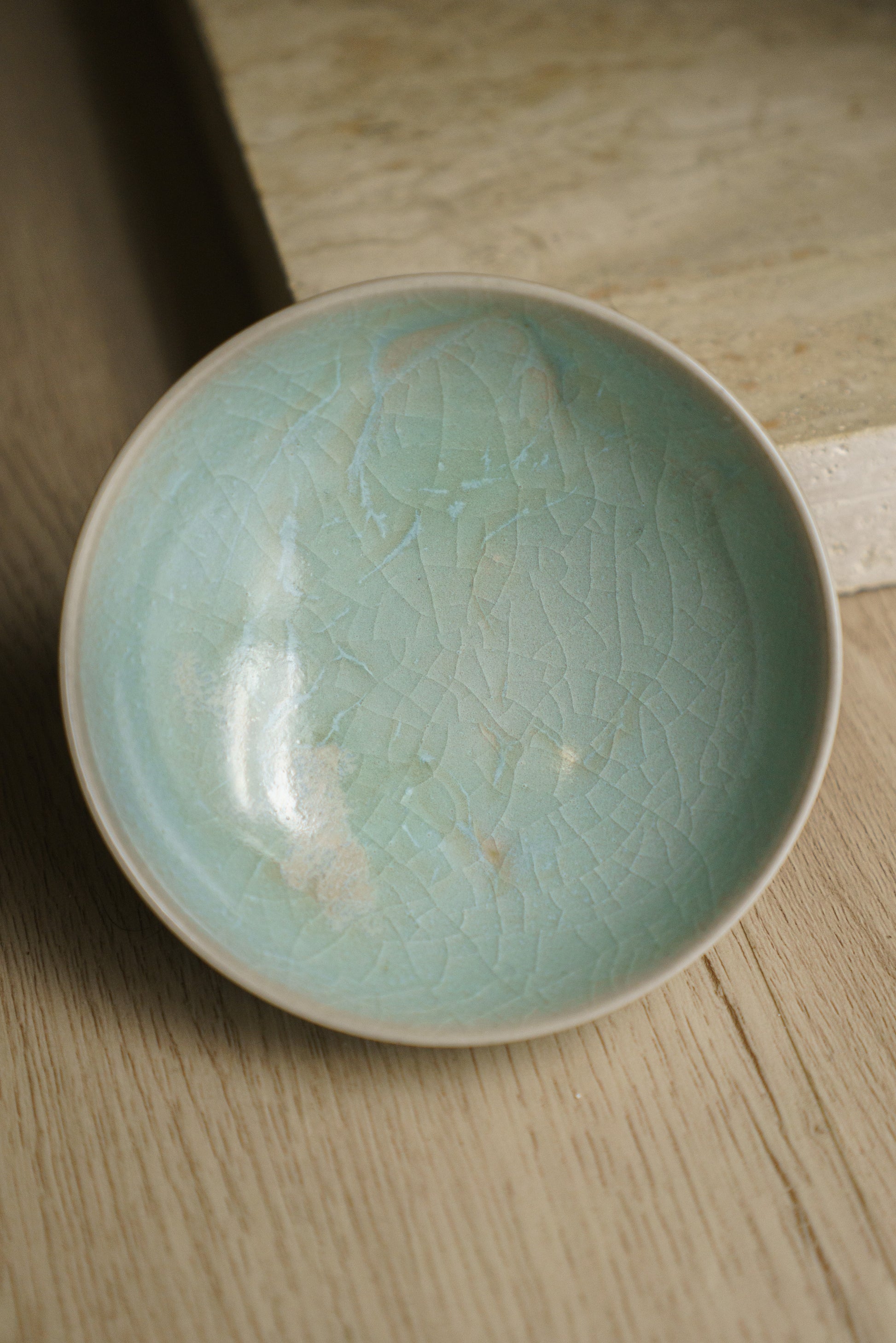 baby blue ceramic bowl with crackles