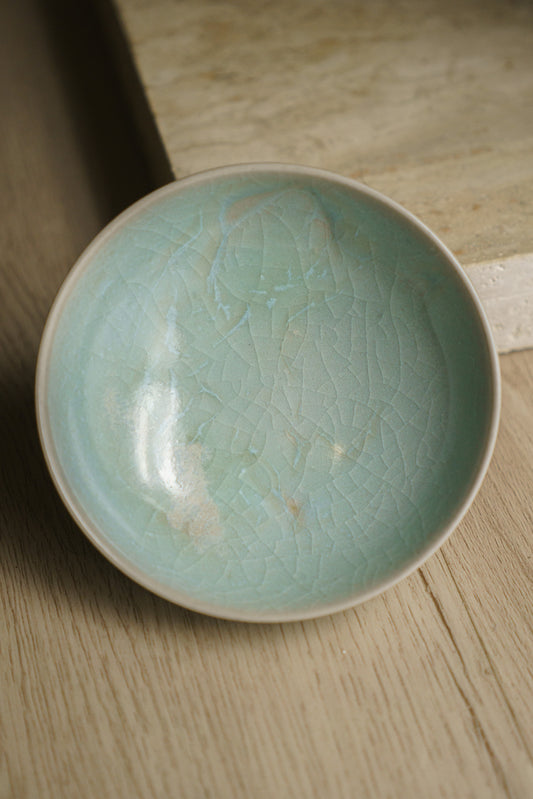 baby blue ceramic bowl with crackles