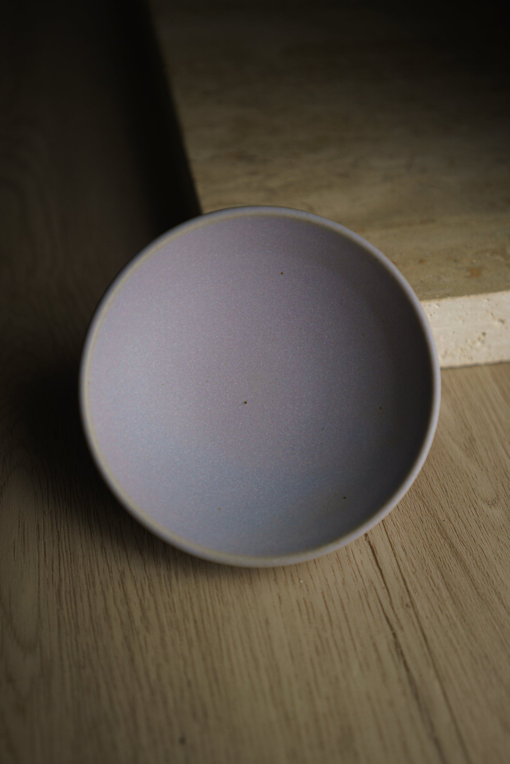 lavender bowl on wooden surface