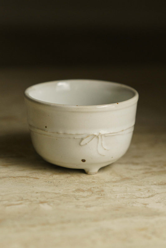 White Ribbon Teacup with Beauty Mark