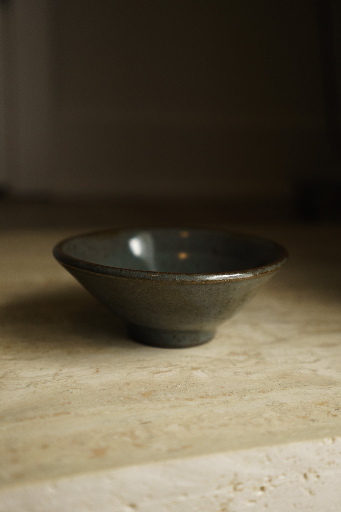 Matte Translucent Turquoise Bowl in Dark Clay