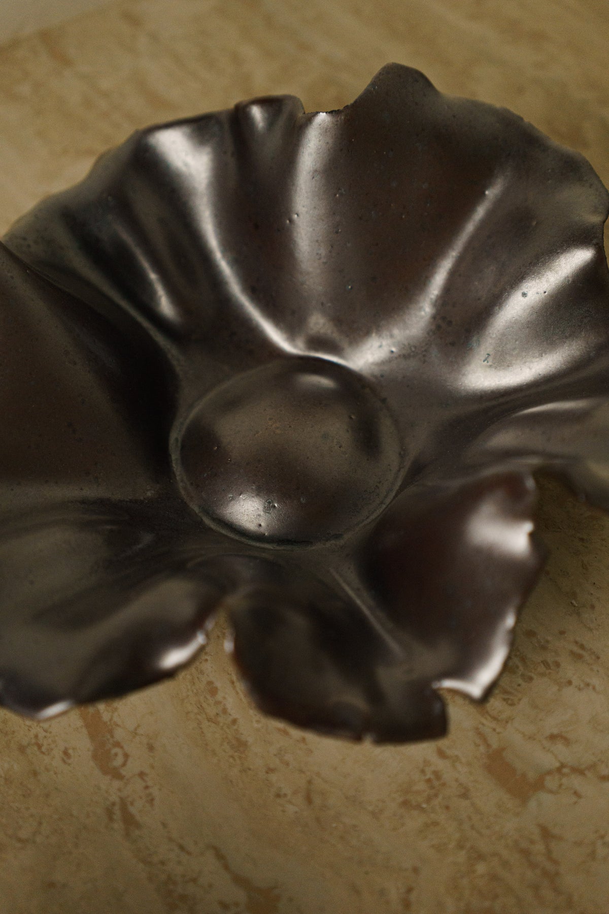 Flowerhead in Metallic Black